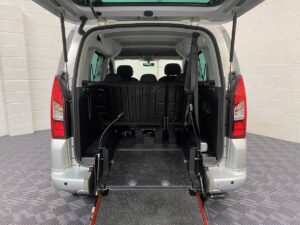 A picture of a typical five seat wheelchair accessible Peugeot Partner in three seat mode.
