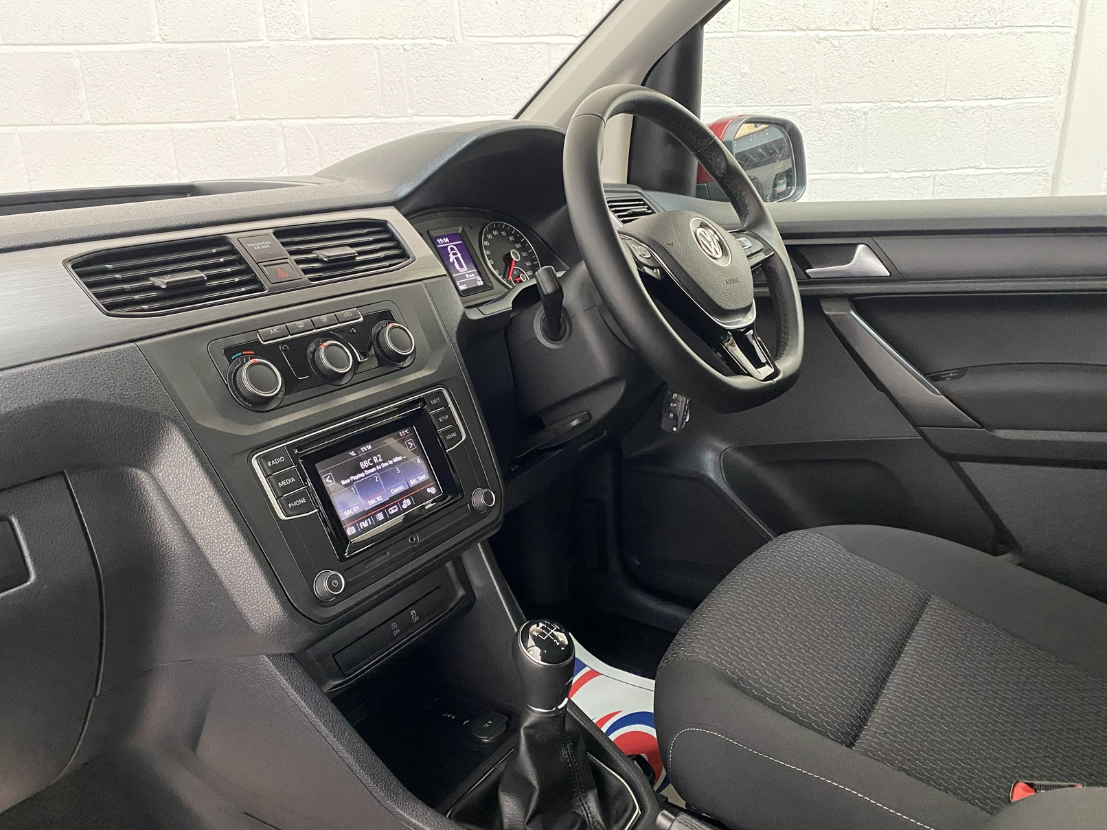 Wheelchair Adapted Volkswagen Caddy Maxi in Metallic Red with only 2000 miles from new. This vehicle is for sale at Michael Harraway cars in Weston super Mare. somerset. SG69 MLO 10