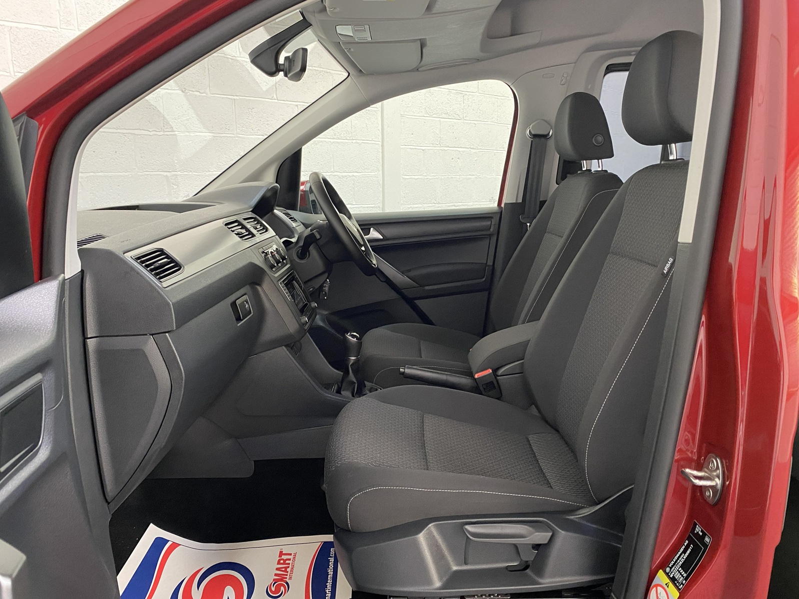 Wheelchair Adapted Volkswagen Caddy Maxi in Metallic Red with only 2000 miles from new. This vehicle is for sale at Michael Harraway cars in Weston super Mare. somerset. SG69 MLO 11