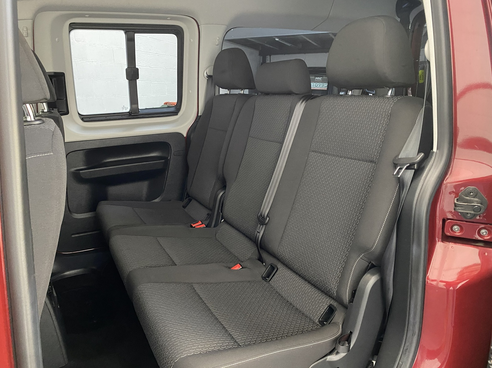 Wheelchair Adapted Volkswagen Caddy Maxi in Metallic Red with only 2000 miles from new. This vehicle is for sale at Michael Harraway cars in Weston super Mare. somerset. SG69 MLO 13