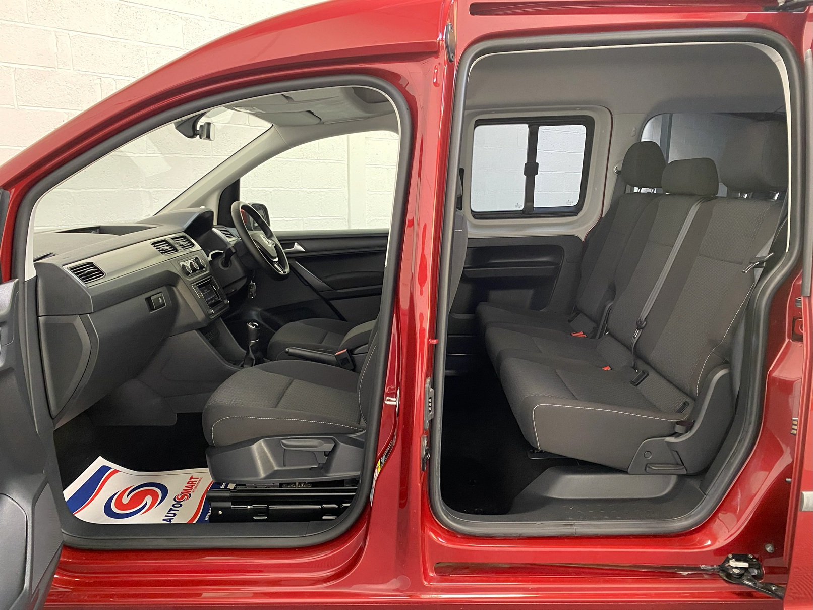 Wheelchair Adapted Volkswagen Caddy Maxi in Metallic Red with only 2000 miles from new. This vehicle is for sale at Michael Harraway cars in Weston super Mare. somerset. SG69 MLO 14