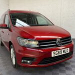 Wheelchair Adapted Volkswagen Caddy Maxi in Metallic Red with only 2000 miles from new. This vehicle is for sale at Michael Harraway cars in Weston super Mare. somerset. SG69 MLO 19