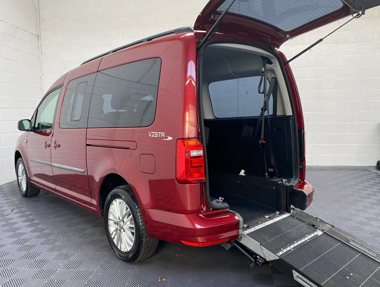 Wheelchair Adapted Volkswagen Caddy Maxi in Metallic Red with only 2000 miles from new. This vehicle is for sale at Michael Harraway cars in Weston super Mare. somerset. SG69 MLO 5
