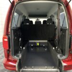 Wheelchair Adapted Volkswagen Caddy Maxi in Metallic Red with only 2000 miles from new. This vehicle is for sale at Michael Harraway cars in Weston super Mare. somerset. SG69 MLO 6