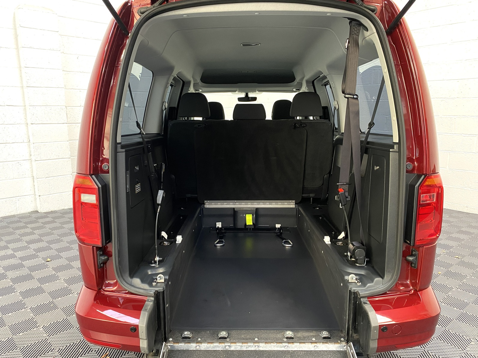 Wheelchair Adapted Volkswagen Caddy Maxi in Metallic Red with only 2000 miles from new. This vehicle is for sale at Michael Harraway cars in Weston super Mare. somerset. SG69 MLO 6