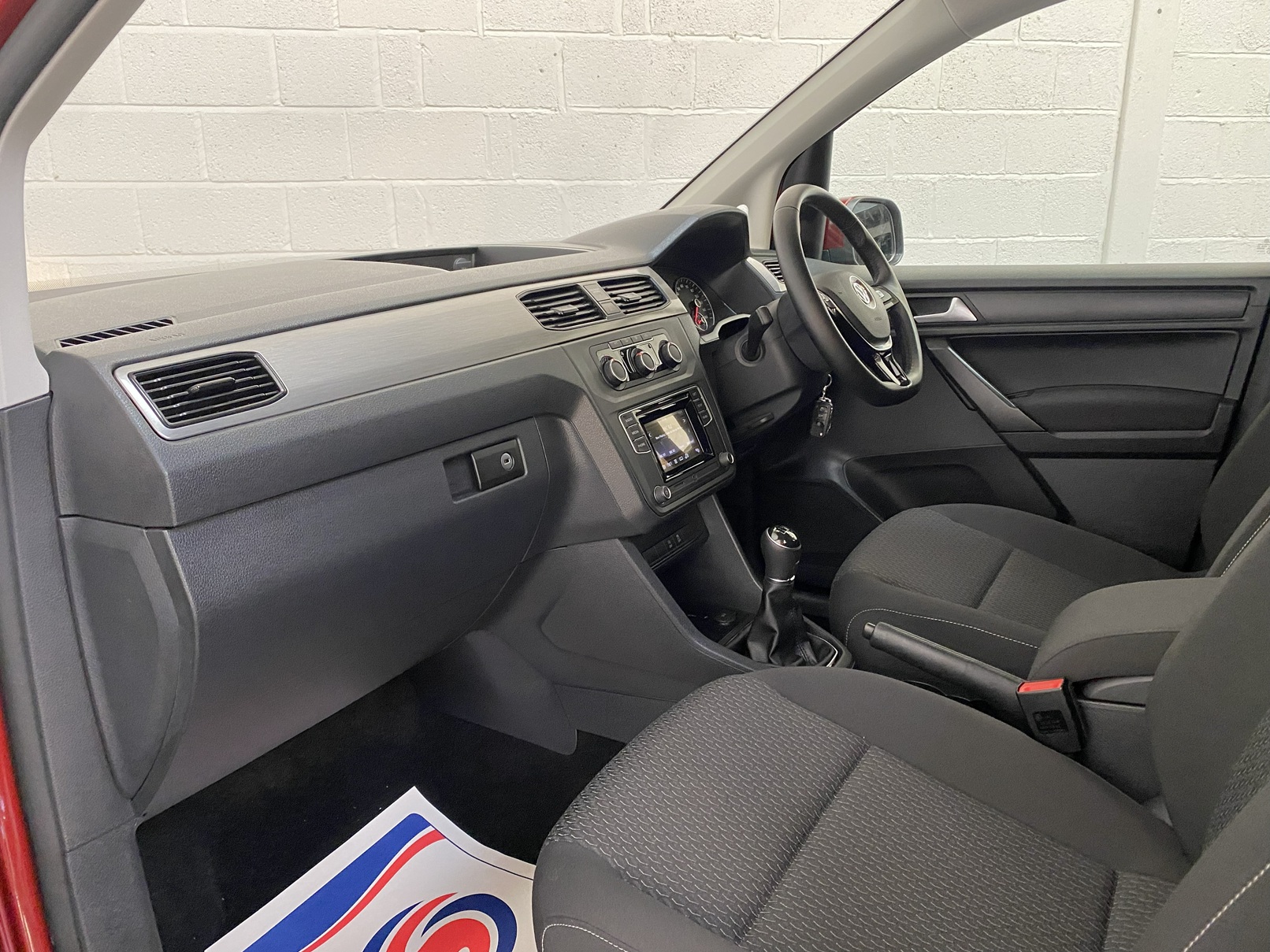 Wheelchair Adapted Volkswagen Caddy Maxi in Metallic Red with only 2000 miles from new. This vehicle is for sale at Michael Harraway cars in Weston super Mare. somerset. SG69 MLO 9