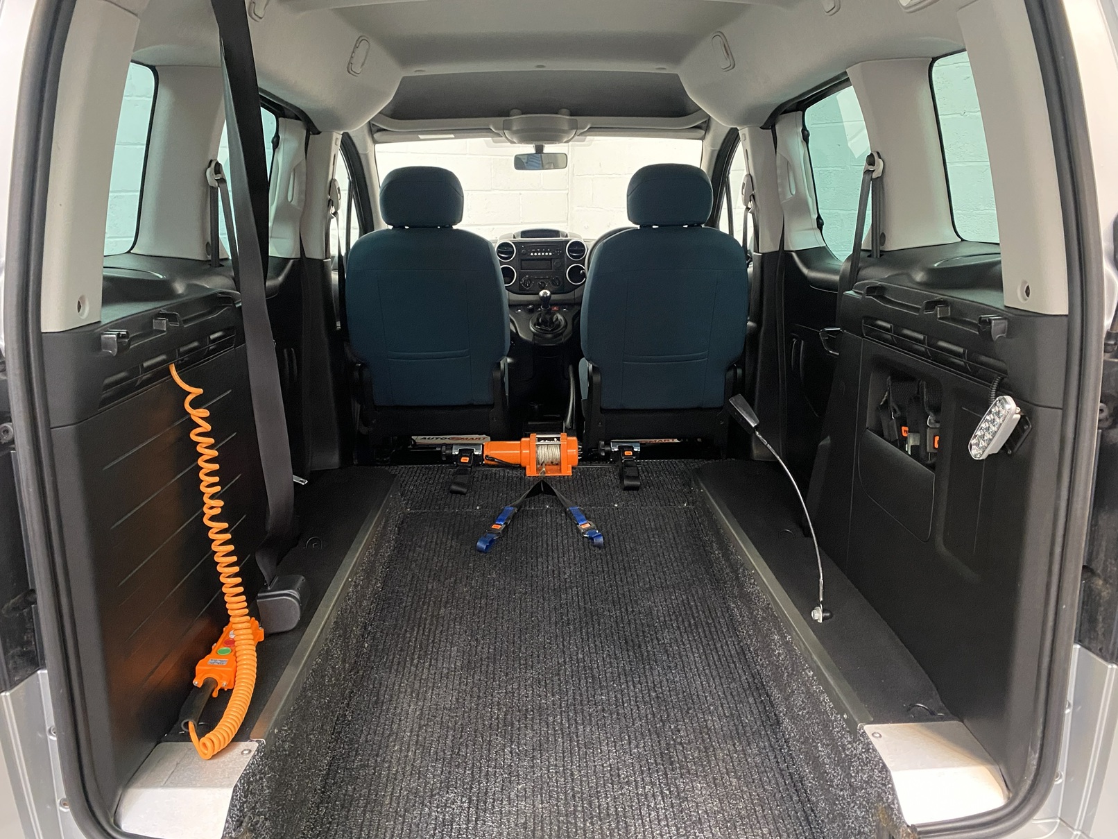 A Citroen Berlingo with a ramp for disabled access. WAV Vehicle. Fors ale at michael Harraway Cars in Weston super Mare. NK18 BVV 12