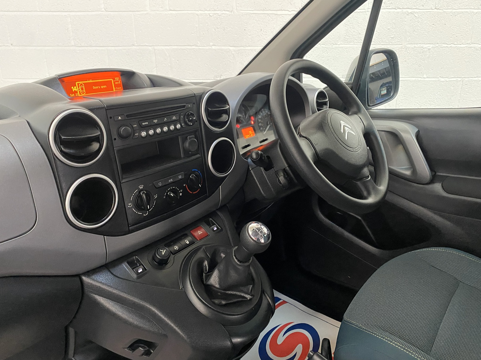 A Citroen Berlingo with a ramp for disabled access. WAV Vehicle. Fors ale at michael Harraway Cars in Weston super Mare. NK18 BVV 14