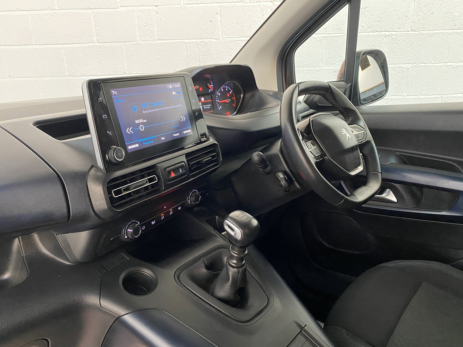 A Peugeot Rifter with Disabled Accessible. Finish in Bronze. Displayed for sale at Michael Harraway Cars who are located in Weston super Mare. SB21 JXV 13