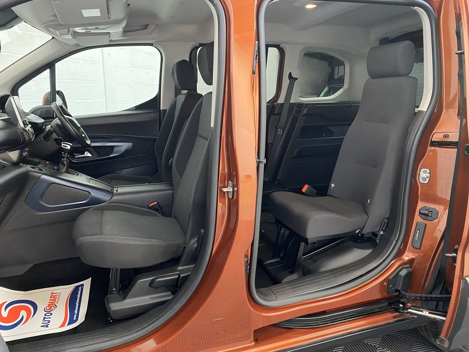 A Peugeot Rifter with Disabled Accessible. Finish in Bronze. Displayed for sale at Michael Harraway Cars who are located in Weston super Mare. SB21 JXV 16