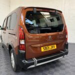 A Peugeot Rifter with Disabled Accessible. Finish in Bronze. Displayed for sale at Michael Harraway Cars who are located in Weston super Mare. SB21 JXV 2