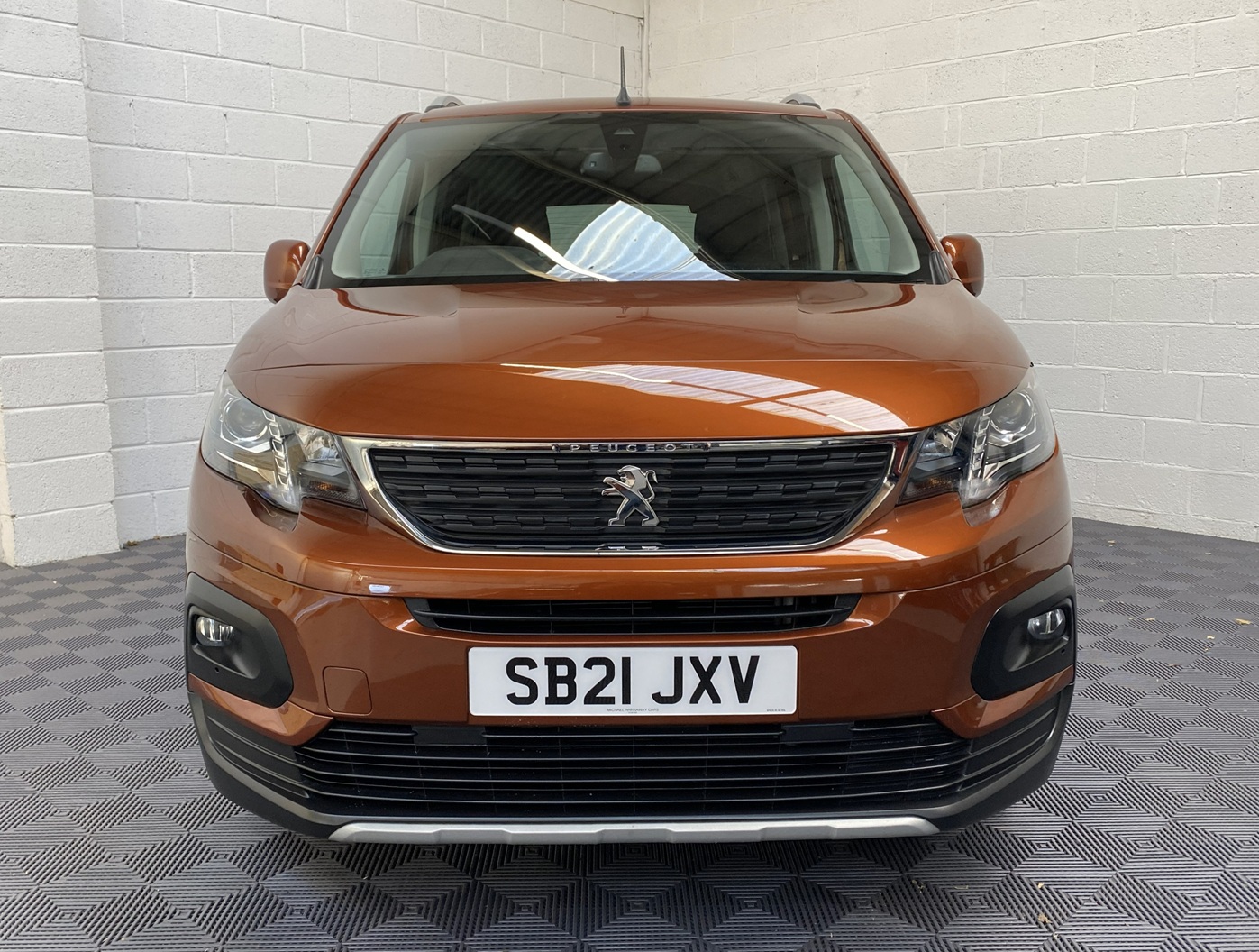 A Peugeot Rifter with Disabled Accessible. Finish in Bronze. Displayed for sale at Michael Harraway Cars who are located in Weston super Mare. SB21 JXV 22