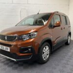 A Peugeot Rifter with Disabled Accessible. Finish in Bronze. Displayed for sale at Michael Harraway Cars who are located in Weston super Mare. SB21 JXV 23