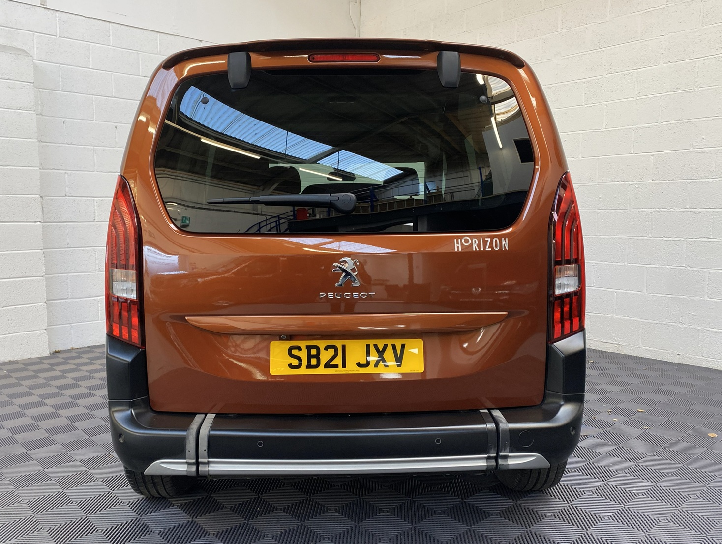 A Peugeot Rifter with Disabled Accessible. Finish in Bronze. Displayed for sale at Michael Harraway Cars who are located in Weston super Mare. SB21 JXV 3