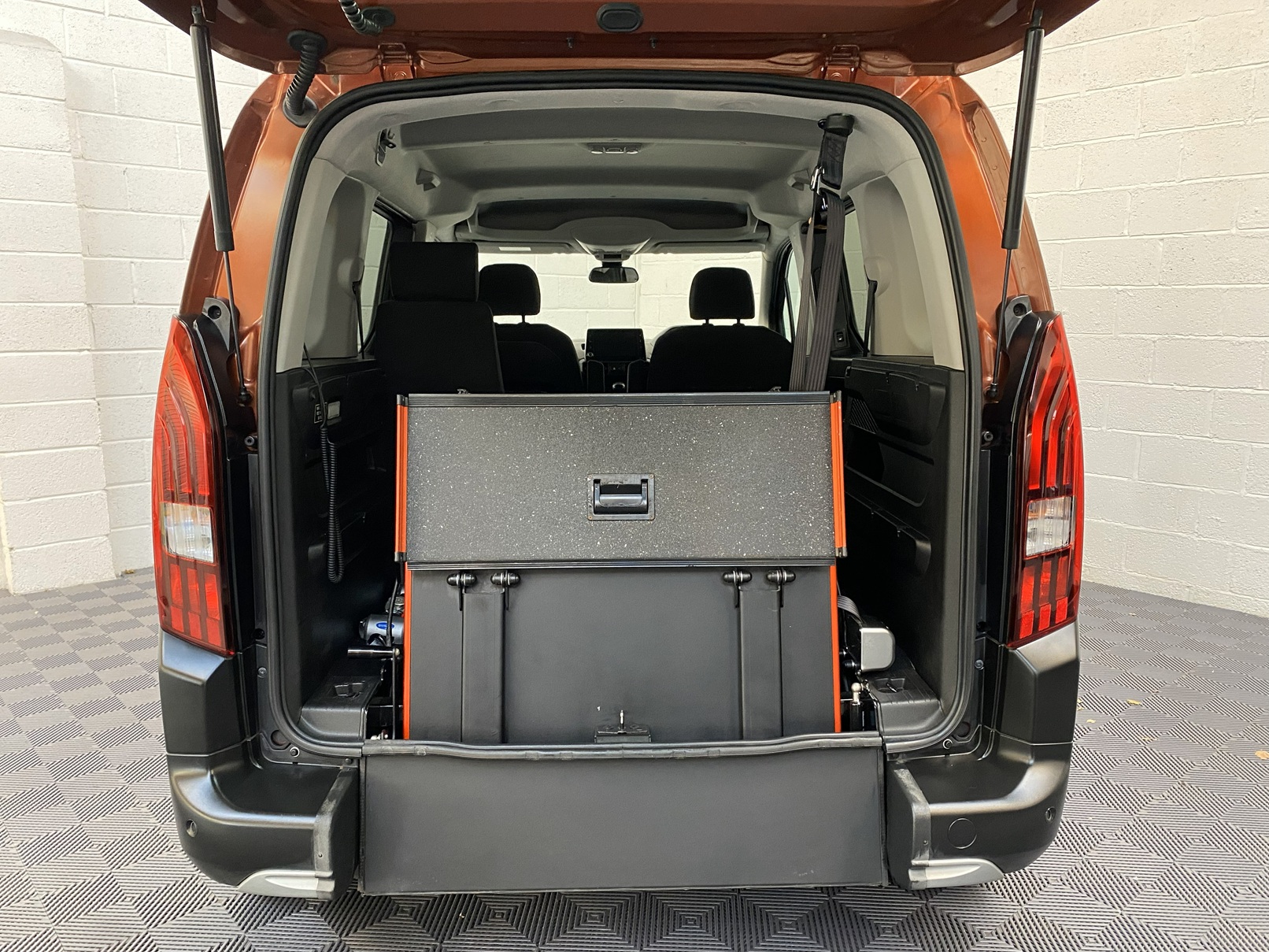 A Peugeot Rifter with Disabled Accessible. Finish in Bronze. Displayed for sale at Michael Harraway Cars who are located in Weston super Mare. SB21 JXV 5