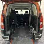 A Peugeot Rifter with Disabled Accessible. Finish in Bronze. Displayed for sale at Michael Harraway Cars who are located in Weston super Mare. SB21 JXV 7