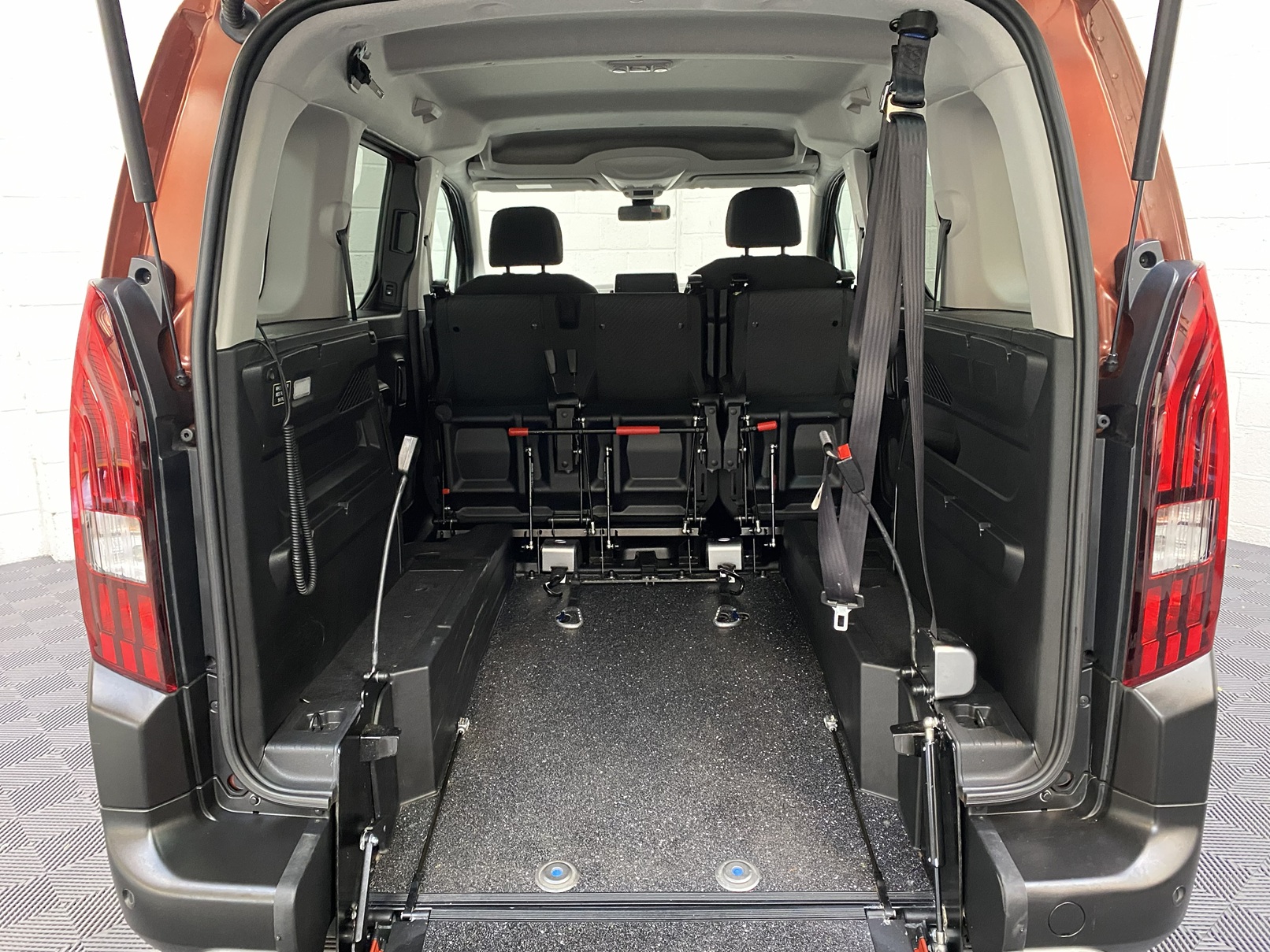 Disabled Accessible Peugeot Rifter in Bronze. It has 5 seats or 3 seats plus wheelchair passenger. This vehicle is for sale at Michael Harraway Cars in Weston super Mare. SF70 JUC 11