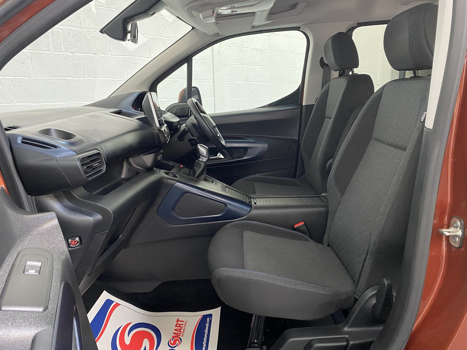 Disabled Accessible Peugeot Rifter in Bronze. It has 5 seats or 3 seats plus wheelchair passenger. This vehicle is for sale at Michael Harraway Cars in Weston super Mare. SF70 JUC 15