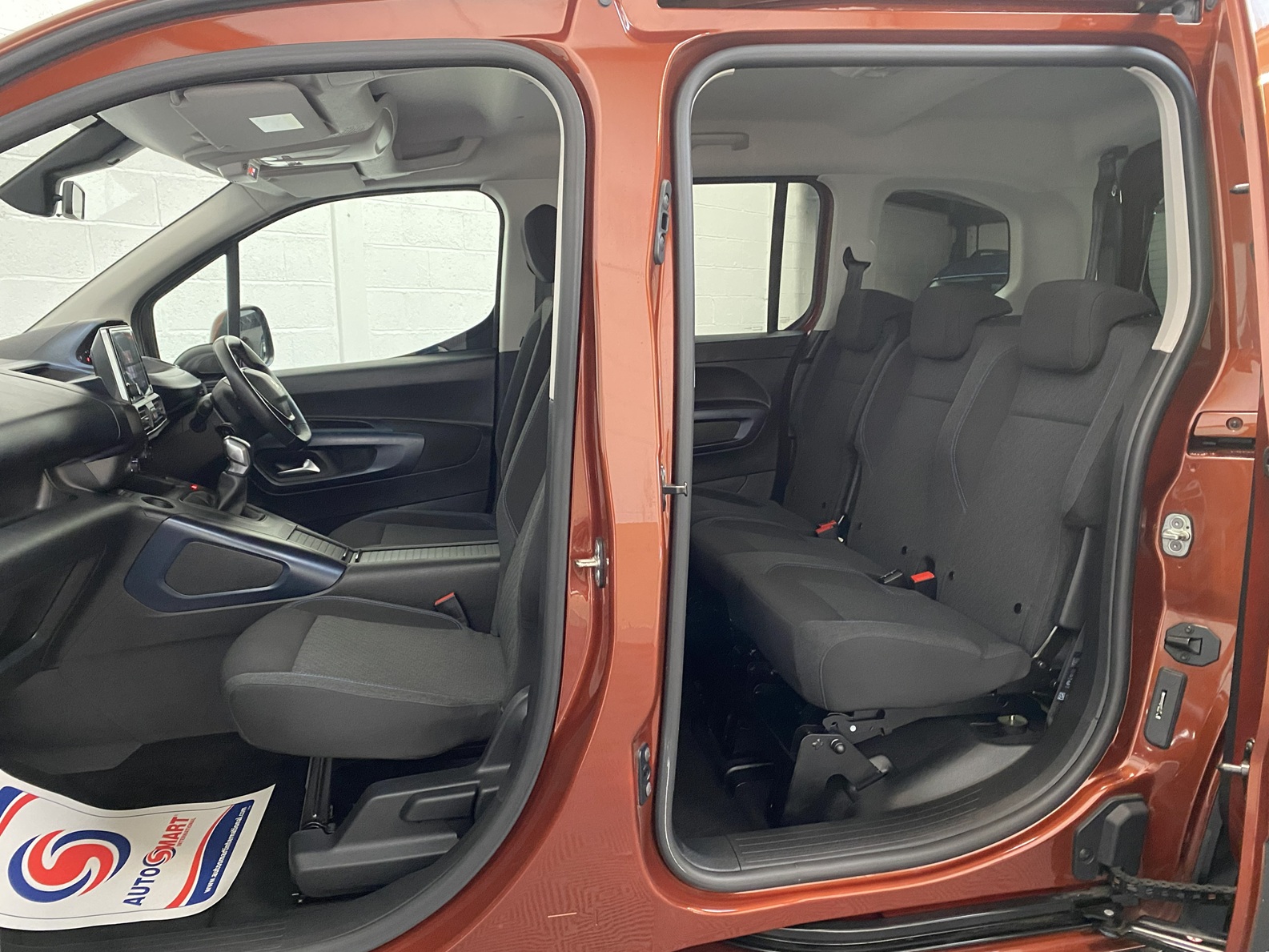 Disabled Accessible Peugeot Rifter in Bronze. It has 5 seats or 3 seats plus wheelchair passenger. This vehicle is for sale at Michael Harraway Cars in Weston super Mare. SF70 JUC 17