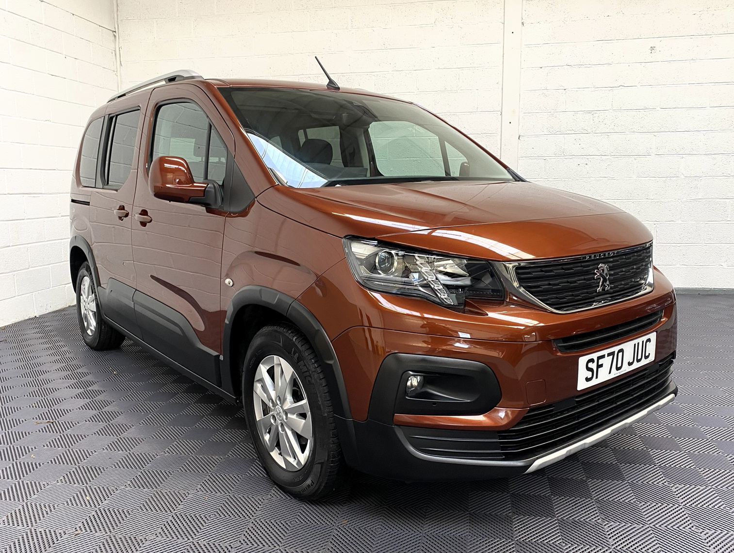 Disabled Accessible Peugeot Rifter in Bronze. It has 5 seats or 3 seats plus wheelchair passenger. This vehicle is for sale at Michael Harraway Cars in Weston super Mare. SF70 JUC 19