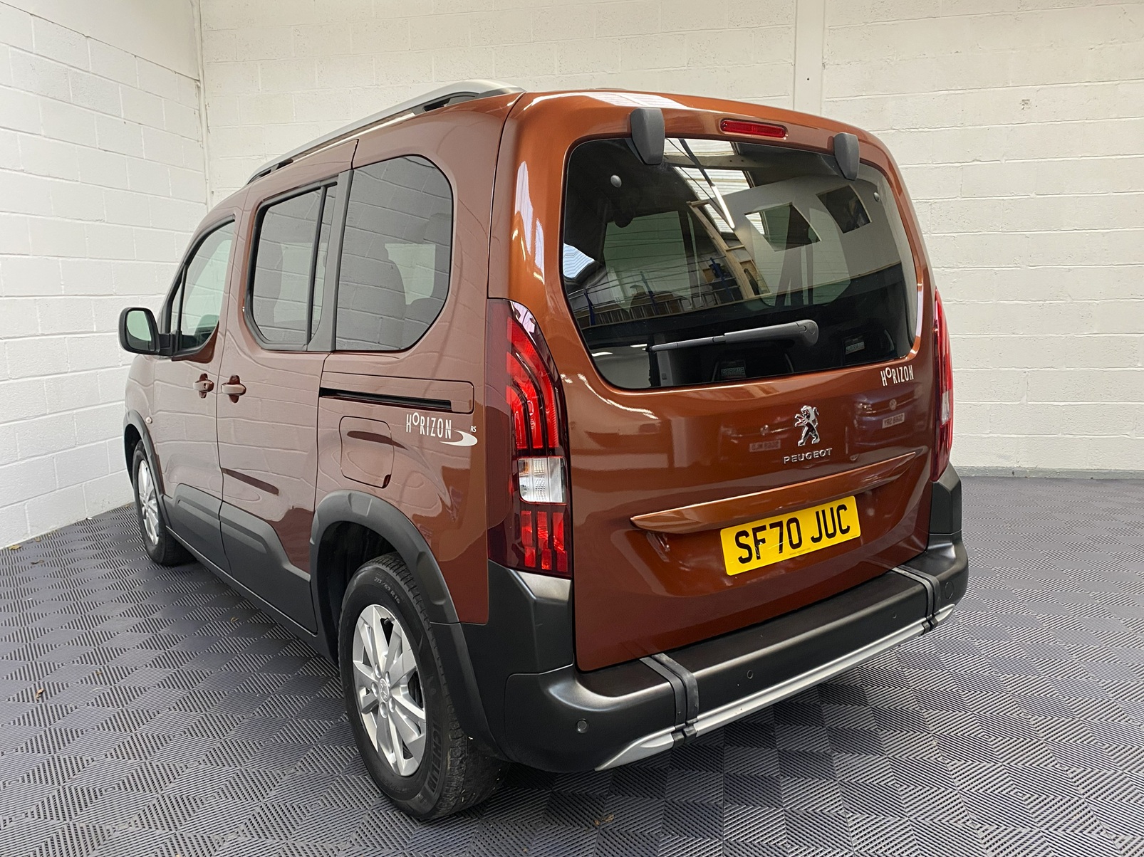 Disabled Accessible Peugeot Rifter in Bronze. It has 5 seats or 3 seats plus wheelchair passenger. This vehicle is for sale at Michael Harraway Cars in Weston super Mare. SF70 JUC 2