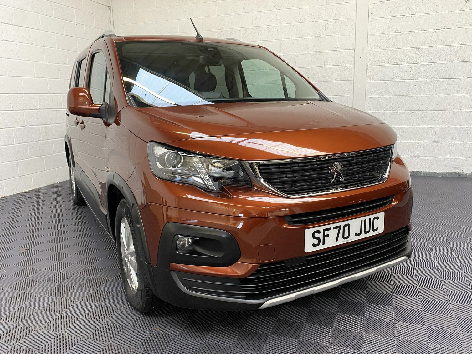 Disabled Accessible Peugeot Rifter in Bronze. It has 5 seats or 3 seats plus wheelchair passenger. This vehicle is for sale at Michael Harraway Cars in Weston super Mare. SF70 JUC 20