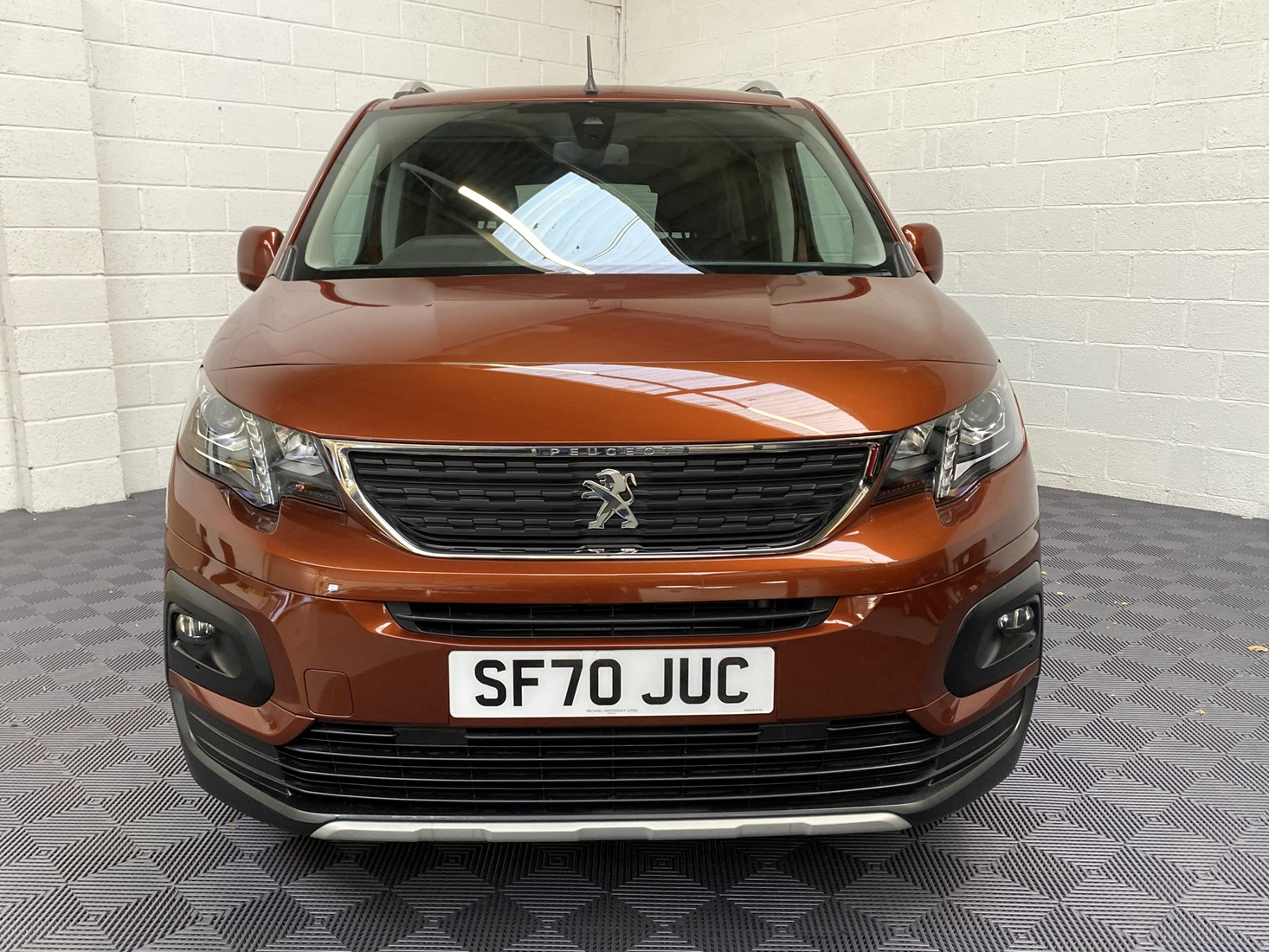 Disabled Accessible Peugeot Rifter in Bronze. It has 5 seats or 3 seats plus wheelchair passenger. This vehicle is for sale at Michael Harraway Cars in Weston super Mare. SF70 JUC 21