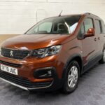 Disabled Accessible Peugeot Rifter in Bronze. It has 5 seats or 3 seats plus wheelchair passenger. This vehicle is for sale at Michael Harraway Cars in Weston super Mare. SF70 JUC 22