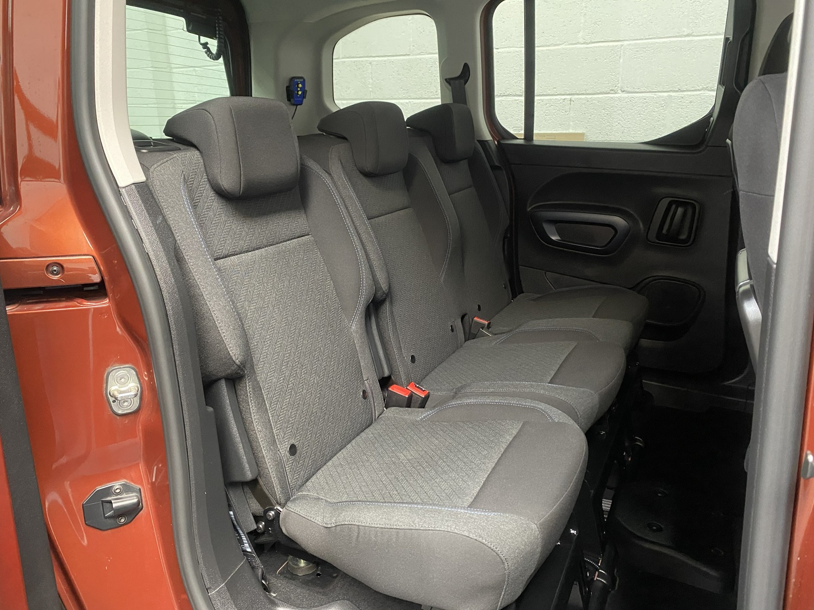 Disabled Accessible Peugeot Rifter in Bronze. It has 5 seats or 3 seats plus wheelchair passenger. This vehicle is for sale at Michael Harraway Cars in Weston super Mare. SF70 JUC 26