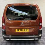 Disabled Accessible Peugeot Rifter in Bronze. It has 5 seats or 3 seats plus wheelchair passenger. This vehicle is for sale at Michael Harraway Cars in Weston super Mare. SF70 JUC 3