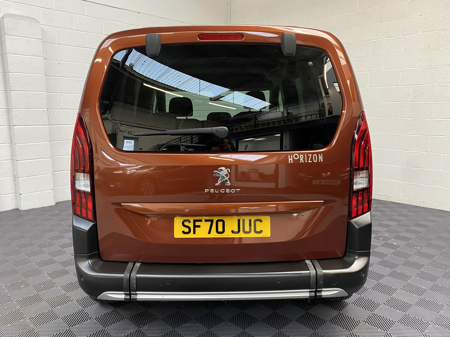 Disabled Accessible Peugeot Rifter in Bronze. It has 5 seats or 3 seats plus wheelchair passenger. This vehicle is for sale at Michael Harraway Cars in Weston super Mare. SF70 JUC 3