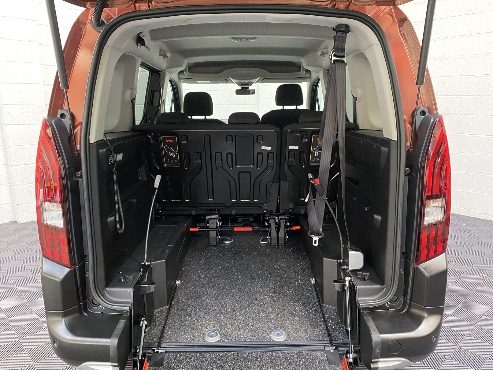 Disabled Accessible Peugeot Rifter in Bronze. It has 5 seats or 3 seats plus wheelchair passenger. This vehicle is for sale at Michael Harraway Cars in Weston super Mare. SF70 JUC 6