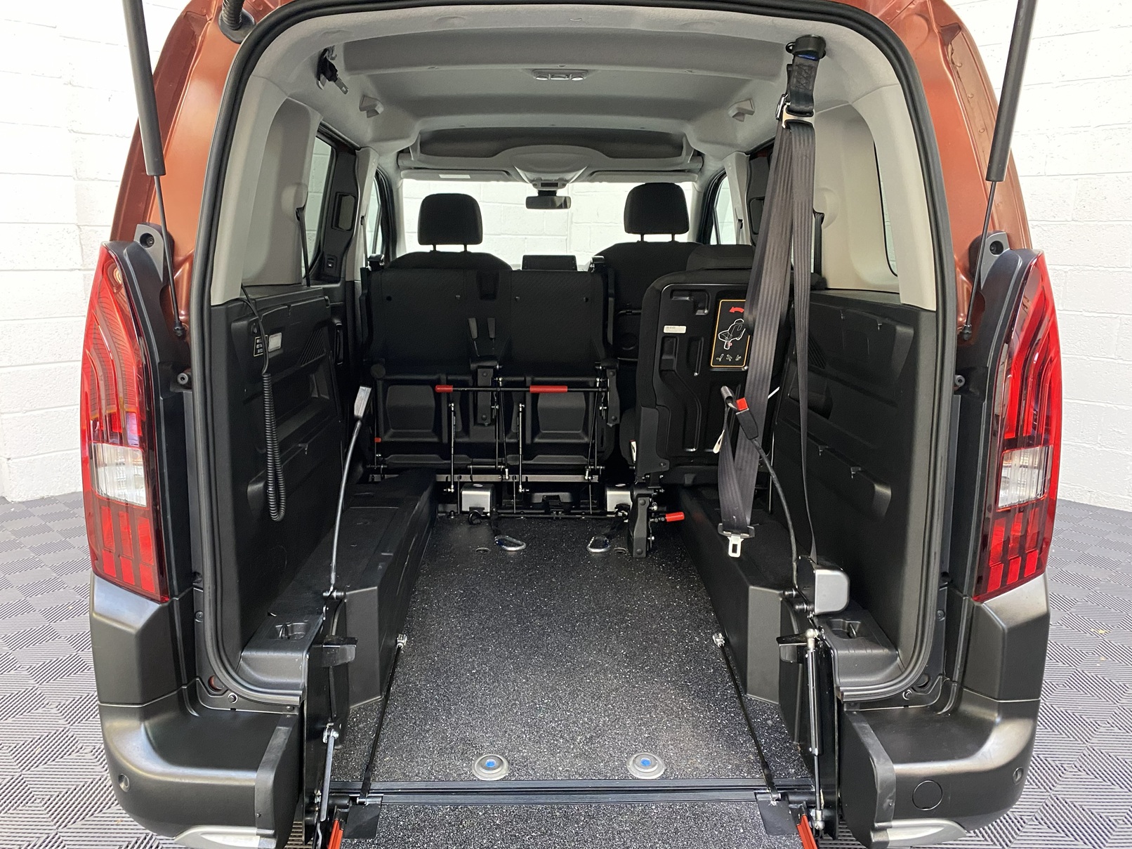 Disabled Accessible Peugeot Rifter in Bronze. It has 5 seats or 3 seats plus wheelchair passenger. This vehicle is for sale at Michael Harraway Cars in Weston super Mare. SF70 JUC 9