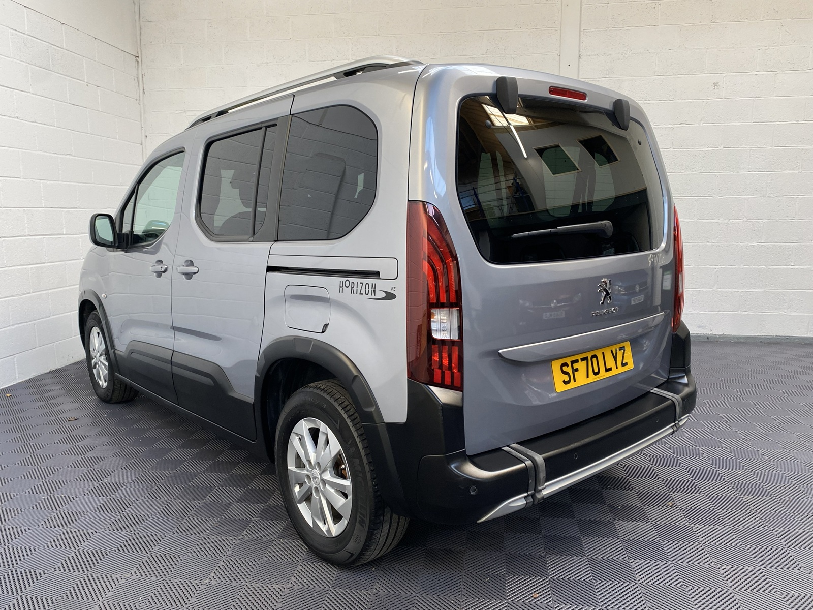 A Peugeot Rifter with Disabled Accessible. Finish in Bronze. Displayed for sale at Michael Harraway Cars who are located in Weston super Mare. SF70 LYZ 1