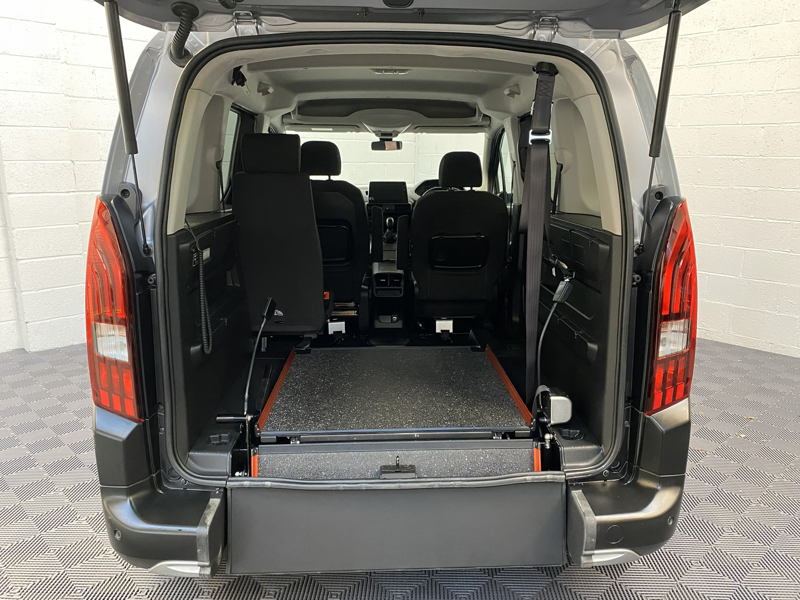 A Peugeot Rifter with Disabled Accessible. Finish in Bronze. Displayed for sale at Michael Harraway Cars who are located in Weston super Mare. SF70 LYZ 12