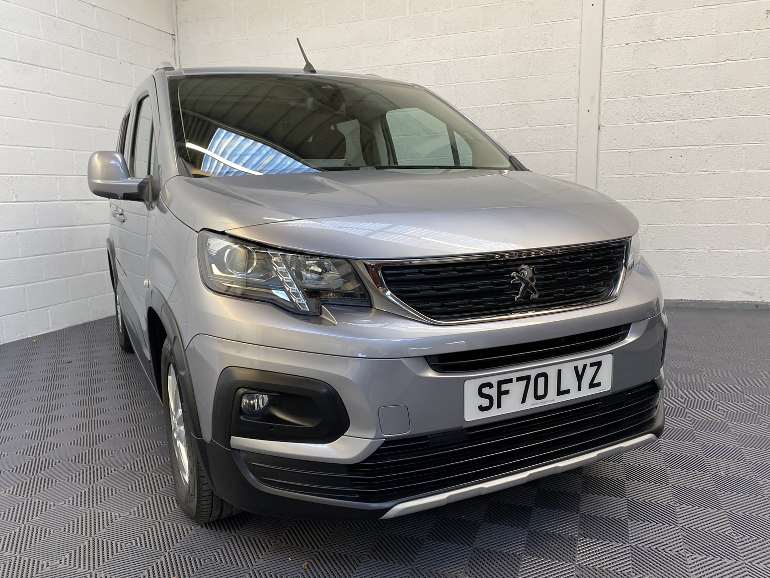 A Peugeot Rifter with Disabled Accessible. Finish in Bronze. Displayed for sale at Michael Harraway Cars who are located in Weston super Mare. SF70 LYZ 17