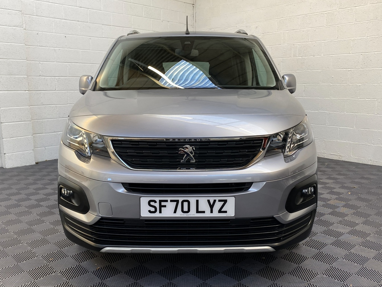 A Peugeot Rifter with Disabled Accessible. Finish in Bronze. Displayed for sale at Michael Harraway Cars who are located in Weston super Mare. SF70 LYZ 18