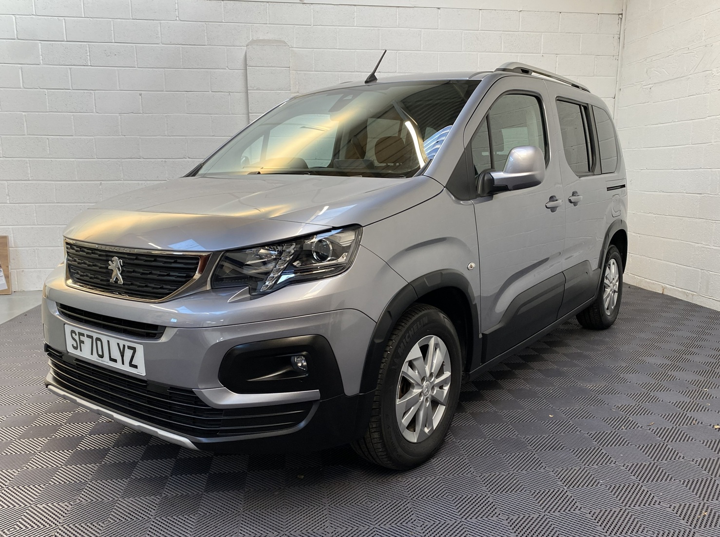 A Peugeot Rifter with Disabled Accessible. Finish in Bronze. Displayed for sale at Michael Harraway Cars who are located in Weston super Mare. SF70 LYZ 19