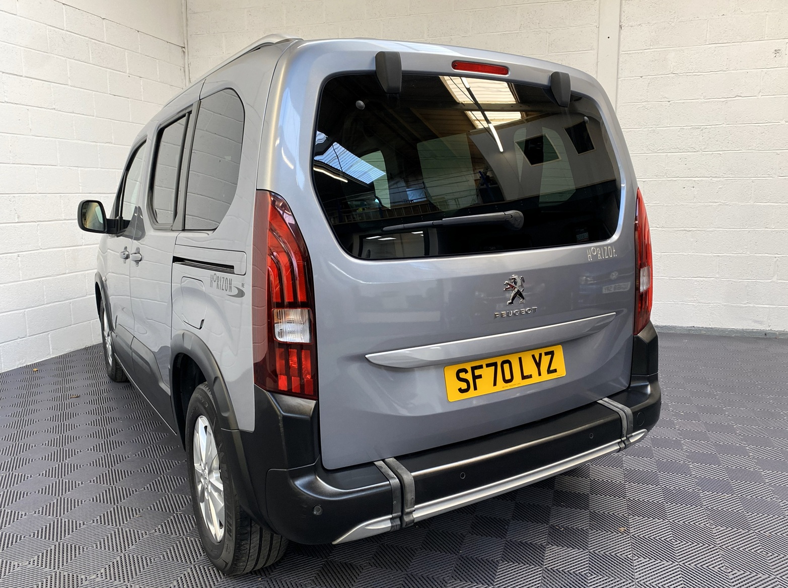 A Peugeot Rifter with Disabled Accessible. Finish in Bronze. Displayed for sale at Michael Harraway Cars who are located in Weston super Mare. SF70 LYZ 2