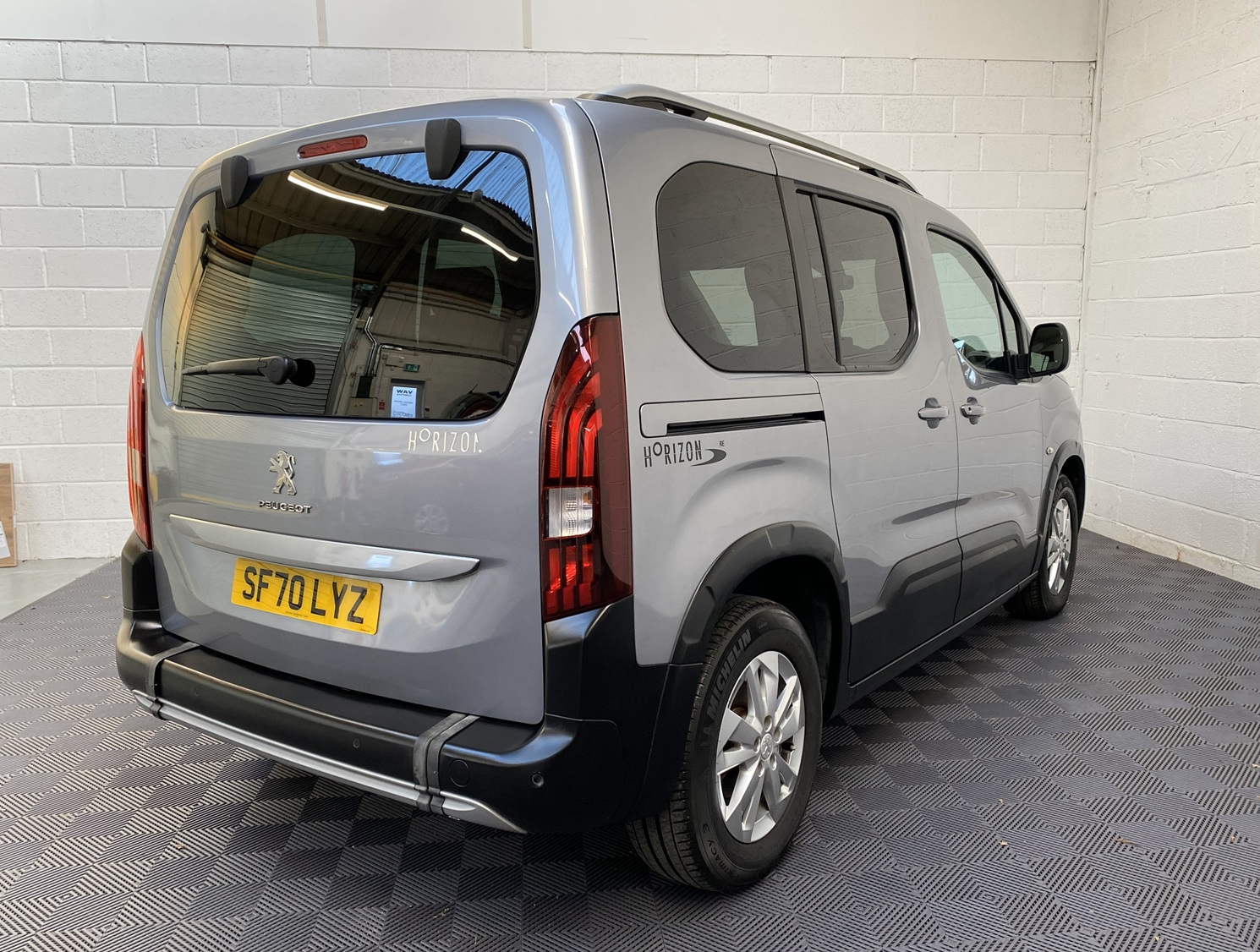 A Peugeot Rifter with Disabled Accessible. Finish in Bronze. Displayed for sale at Michael Harraway Cars who are located in Weston super Mare. SF70 LYZ 4