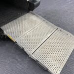 A rear wheelchair ramp folded out on wheelchair accessible accessible (WAV) Citroen Berlingo that is for sale at Michael Harraway Cars in Weston super Mare NK68 AYF 10