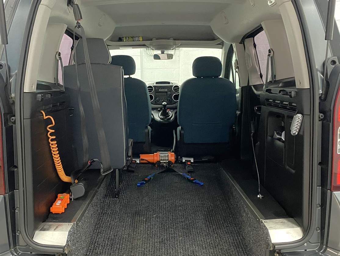 rear Interior view showing lowered rear floor section of a wheelchair accessible accessible (WAV) Citroen Berlingo that is for sale at Michael Harraway Cars in Weston super Mare NK68 AYF 12