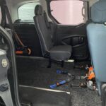 The rear single seat of a wheelchair accessible Citroen Berlingo Nk68 AYF 19