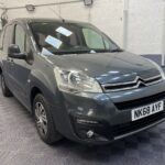 A Grey wheelchair accessible accessible (WAV) Citroen Berlingo that is for sale at Michael Harraway Cars Front view. NK68 AYF 2
