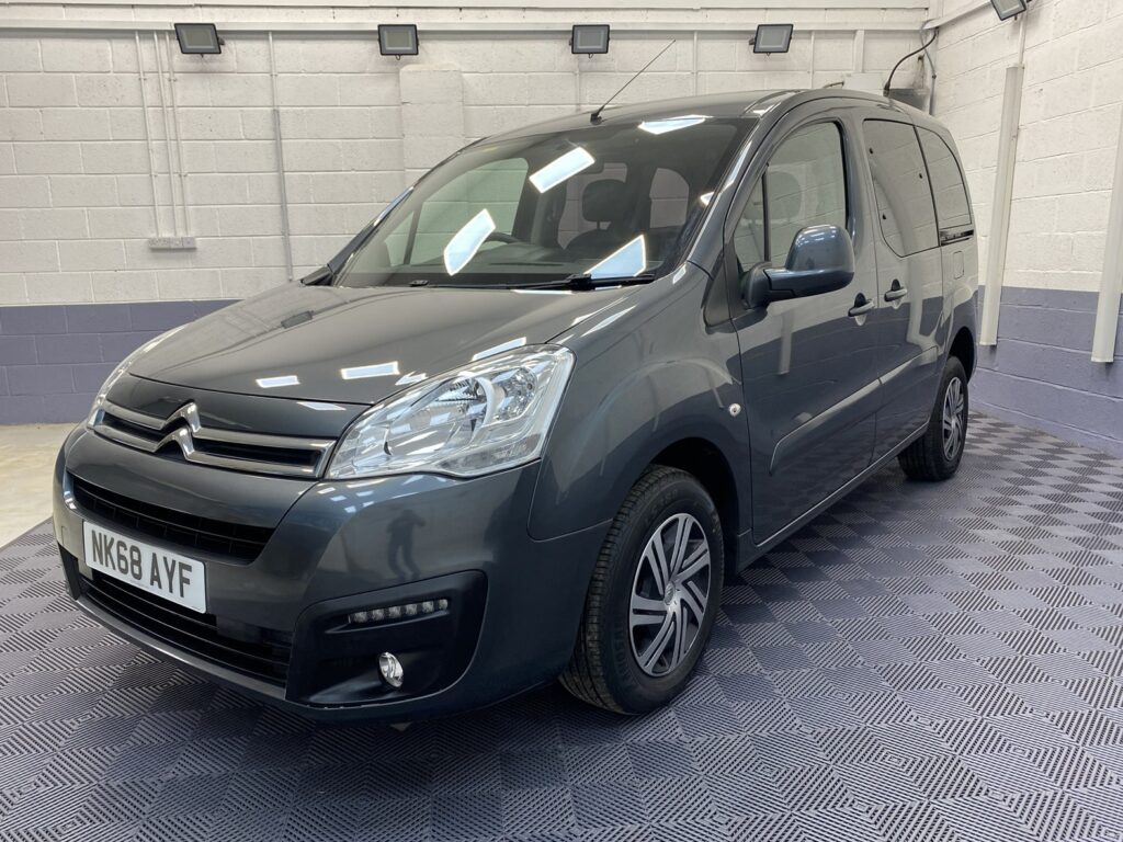 A Grey wheelchair accessible accessible (WAV) Citroen Berlingo that is for sale at Michael Harraway Cars Front side view. NK68 AYF 4