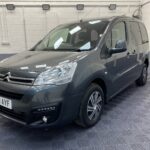 A Grey wheelchair accessible accessible (WAV) Citroen Berlingo that is for sale at Michael Harraway Cars Front side view. NK68 AYF 4