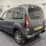 A Grey wheelchair accessible accessible (WAV) Citroen Berlingo that is for sale at Michael Harraway Cars in Weston super Mare Rear side view. NK68 AYF 5