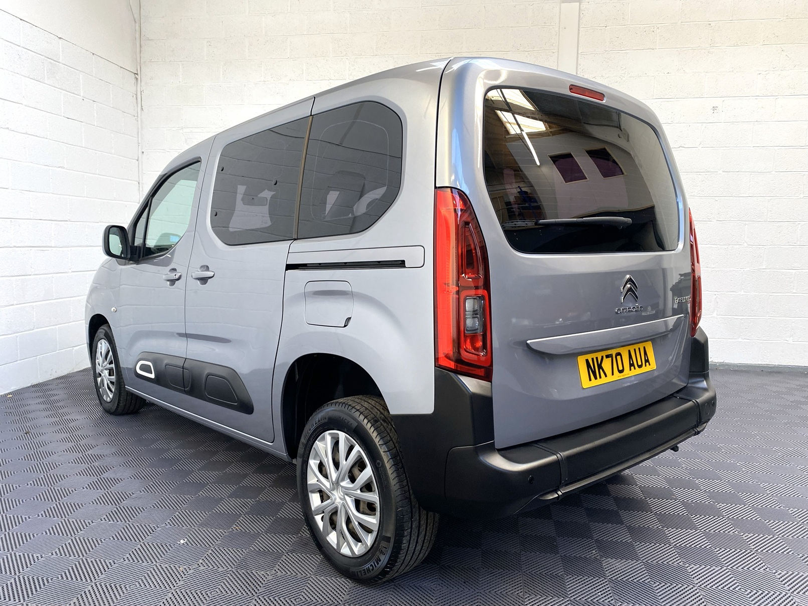 Citroen Berlingo WAV wheelchair accessible vehicle for sale at Michael Harraway Cars, Weston-super-Mare, with three passenger seats, space for one wheelchair user, and a lightweight rear access ramp. NK70 AUA 1