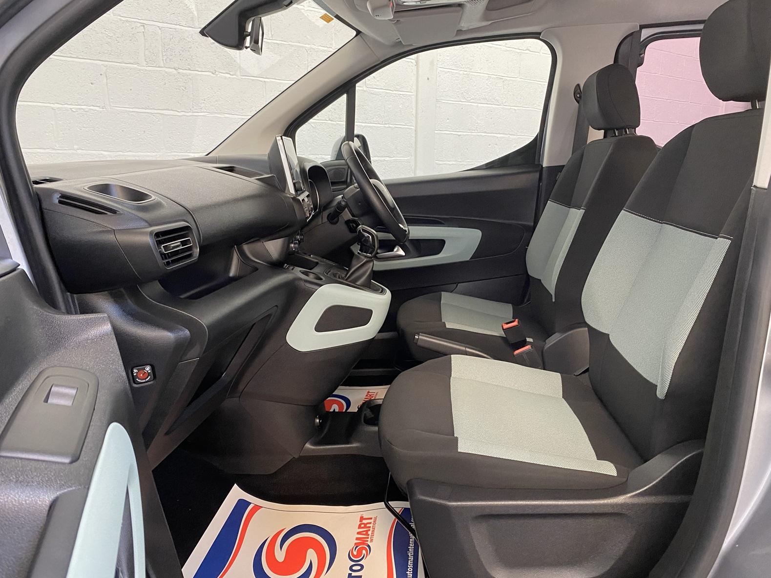 Citroen Berlingo WAV wheelchair accessible vehicle for sale at Michael Harraway Cars, Weston-super-Mare, with three passenger seats, space for one wheelchair user, and a lightweight rear access ramp. NK70 AUA 10