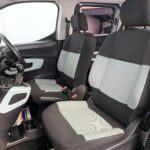 Citroen Berlingo WAV wheelchair accessible vehicle for sale at Michael Harraway Cars, Weston-super-Mare, with three passenger seats, space for one wheelchair user, and a lightweight rear access ramp. NK70 AUA 11